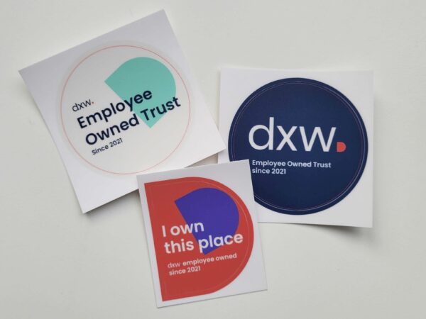 3 of our stickers which read "Employee Owned Trust" and "I own this place"