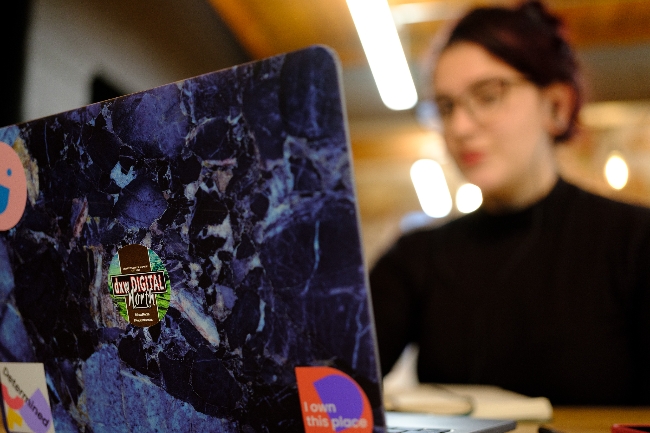 a woman working on a laptop